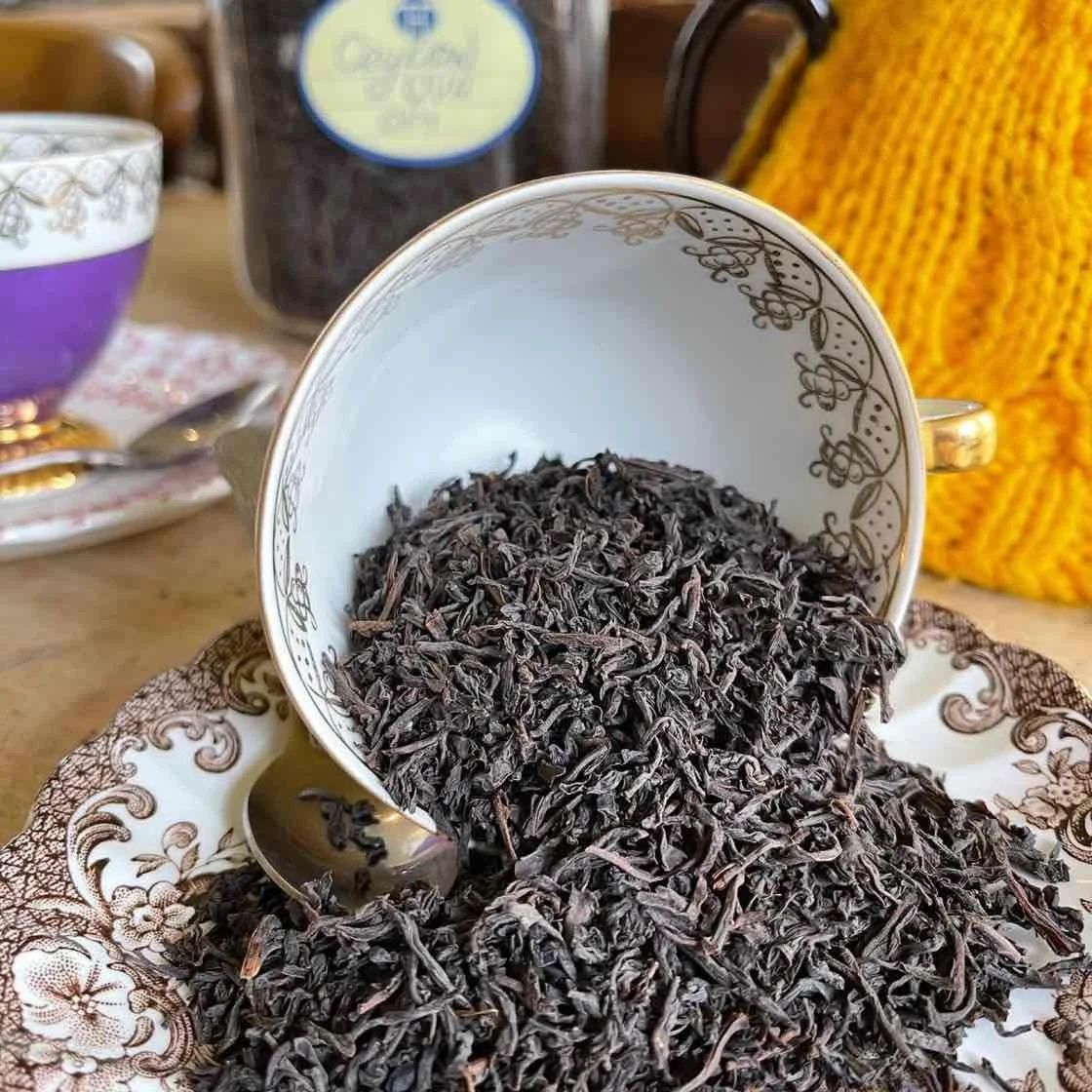 Organic tea leaves and cup