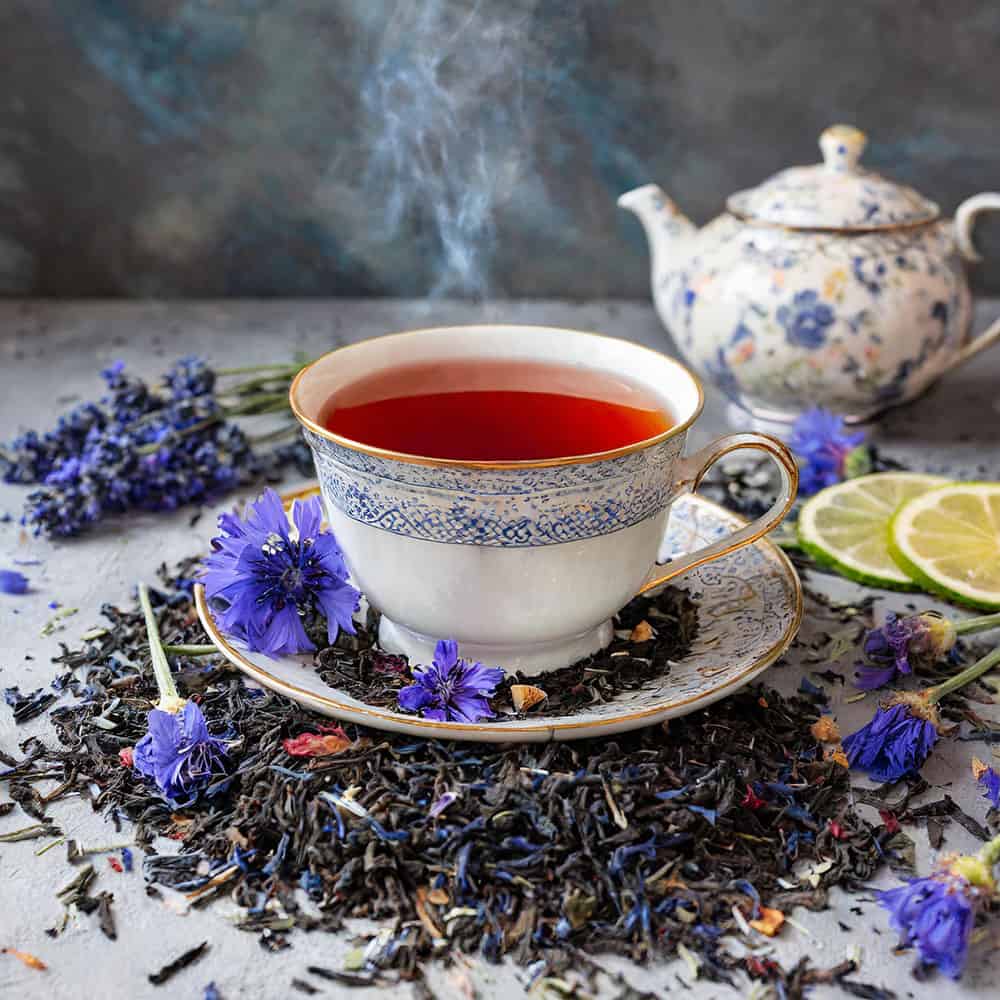 Loose leaf tea served in a glass mug